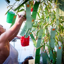 Tying wishes to the traditional Tanabata tree