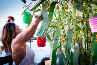 Tying wishes to the traditional Tanabata tree